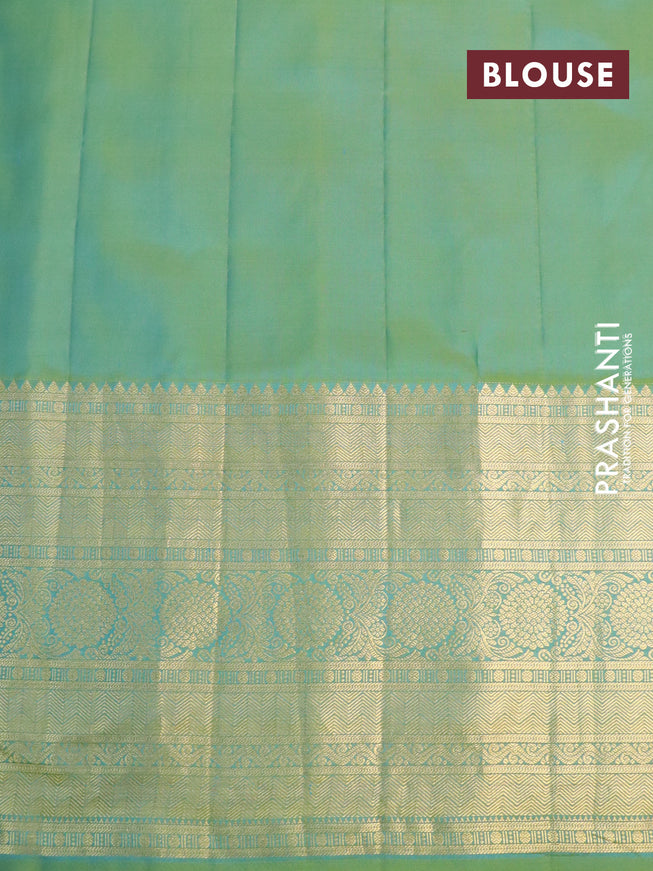 Pure gadwal silk saree jamun shade and dual shade of blue with zari woven buttas and long zari woven border