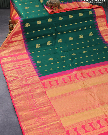 Pure gadwal silk saree green and dual shade of pinkish orange with zari woven buttas and temple design long zari woven border
