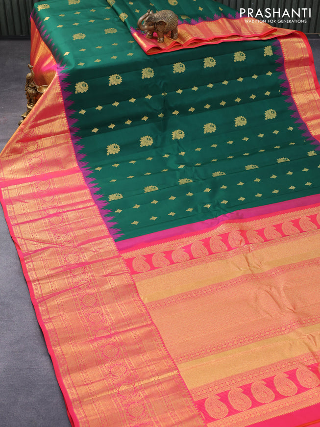 Pure gadwal silk saree green and dual shade of pinkish orange with zari woven buttas and temple design long zari woven border