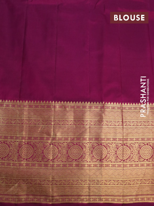Pure gadwal silk saree light green and purple with zari woven buttas and temple design long zari woven border