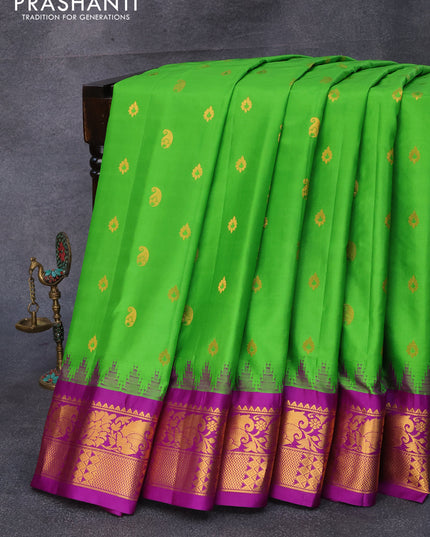 Pure gadwal silk saree parrot green and purple with zari woven buttas and temple design zari woven border