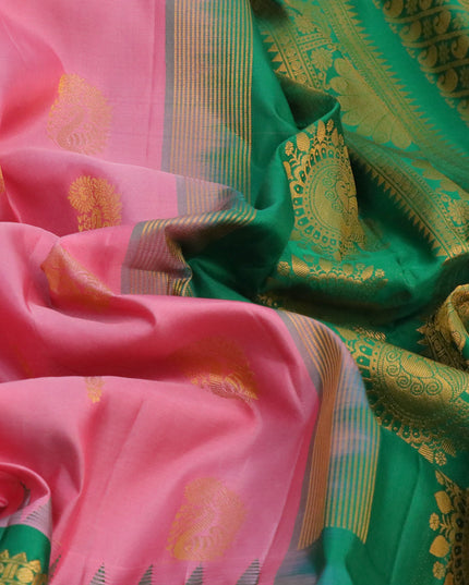 Pure gadwal silk saree light pink and green with zari woven buttas and temple design long zari woven border
