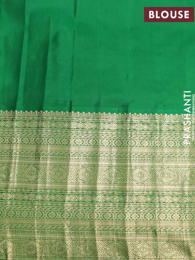 Pure gadwal silk saree dual shade of bluish maroon and green with zari woven buttas and long zari woven border