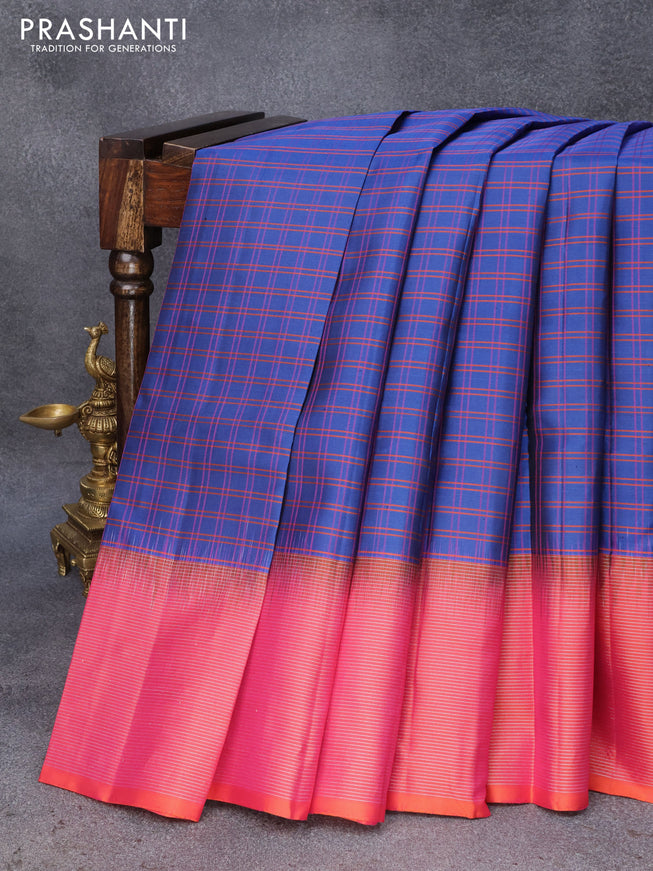 Pure soft silk saree blue and dual shade of pinkish orange with allover checked pattern and silver zari woven simple border