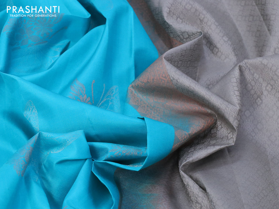 Pure soft silk saree teal blue and grey shade with zari woven butterfly buttas and simple border
