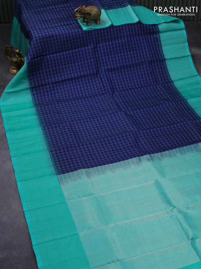 Pure soft silk saree blue and teal green with allover checked pattern and zari woven simple border