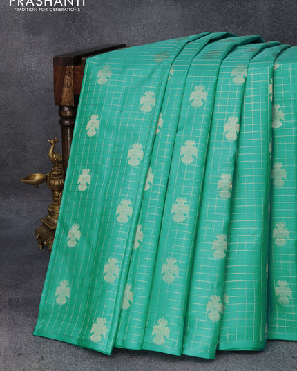 Pure soft silk saree teal blue and brown with allover zari checks & buttas in borderless style