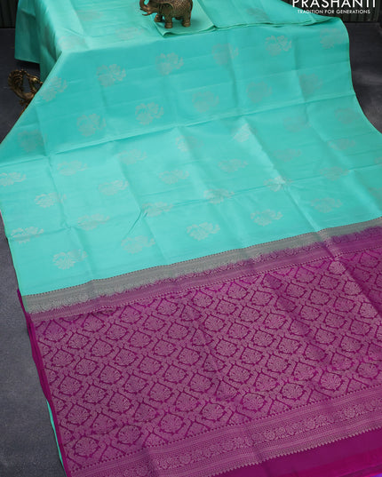 Pure soft silk saree teal green and purple with silver zari woven floral buttas in borderless style