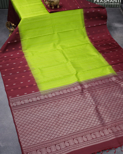 Pure soft silk saree light green and deep maroon with allover silver & copper zari weaves and zari woven butta border