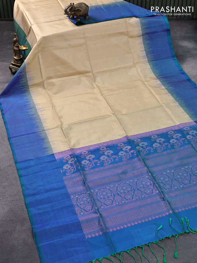 Pure soft silk saree sandal and dual shade of bluish green with plain body and zari checked border