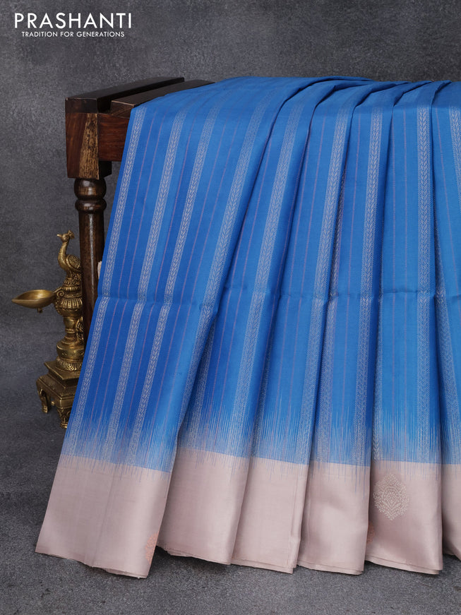 Pure soft silk saree cs blue and pastel grey with silver & copper zari weaves and zari woven butta border