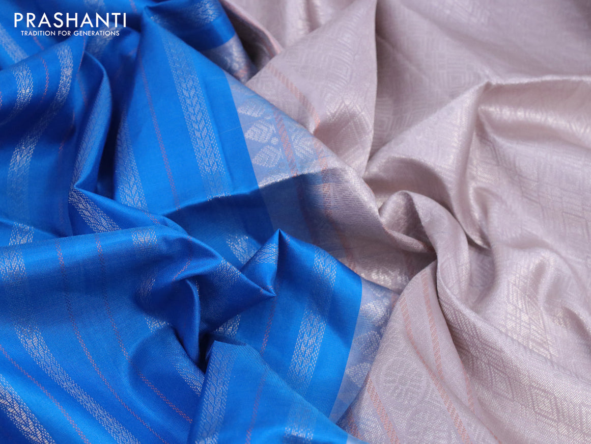 Pure soft silk saree cs blue and pastel grey with silver & copper zari weaves and zari woven butta border