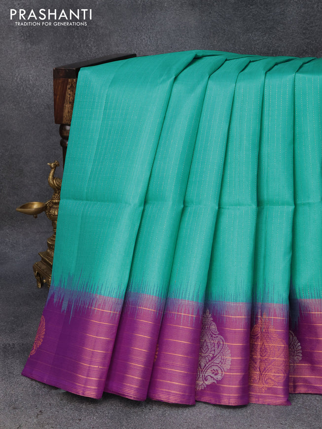 Pure soft silk saree teal blue and purple with allover zari weaves and copper zari woven border
