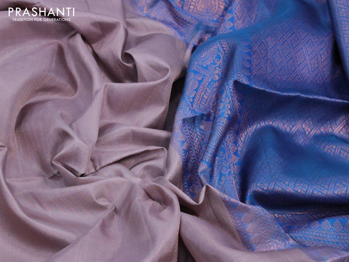 Pure soft silk saree grey shade and cs blue with allover copper zari weaves and zari woven border