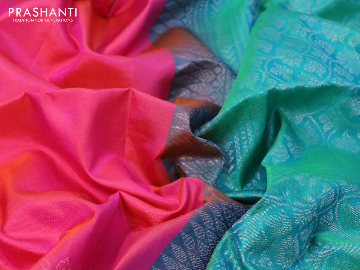 Pure soft silk saree dual shade of pinkish orange and dual shade of teal green with silver & copper zari woven buttas in borderless style
