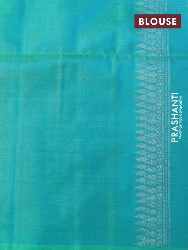 Pure soft silk saree dual shade of pinkish orange and dual shade of teal green with silver & copper zari woven buttas in borderless style