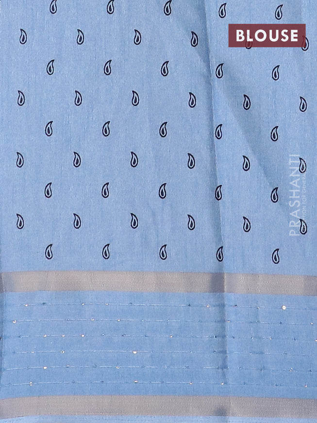 Semi dola saree blue shade with allover warli prints and zari woven sequin work border
