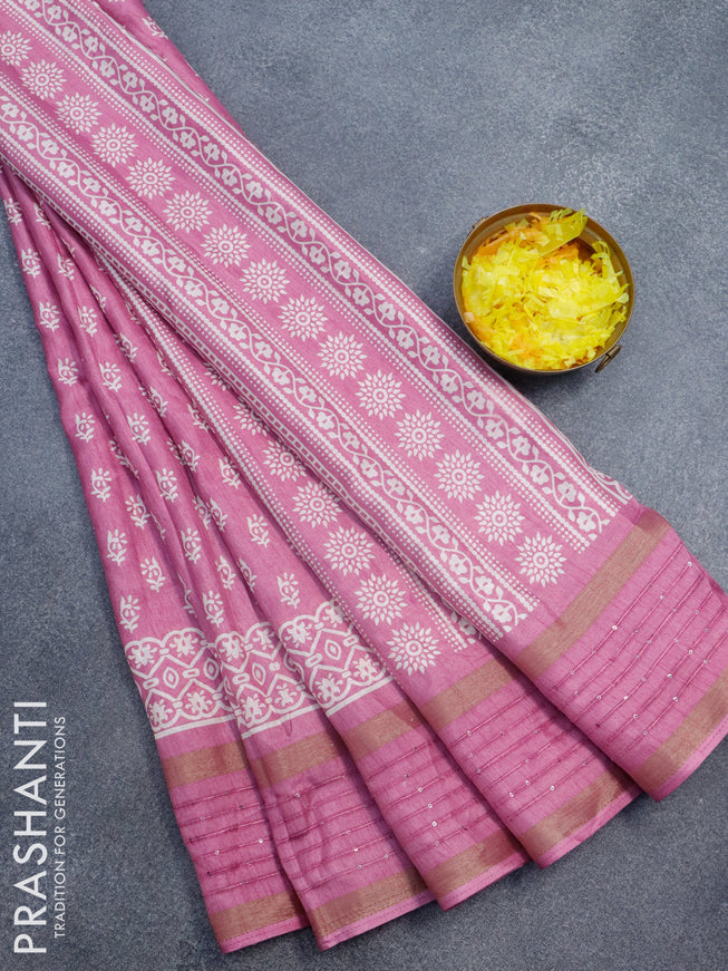 Semi dola saree pink with allover floral butta prints and zari woven sequin work border