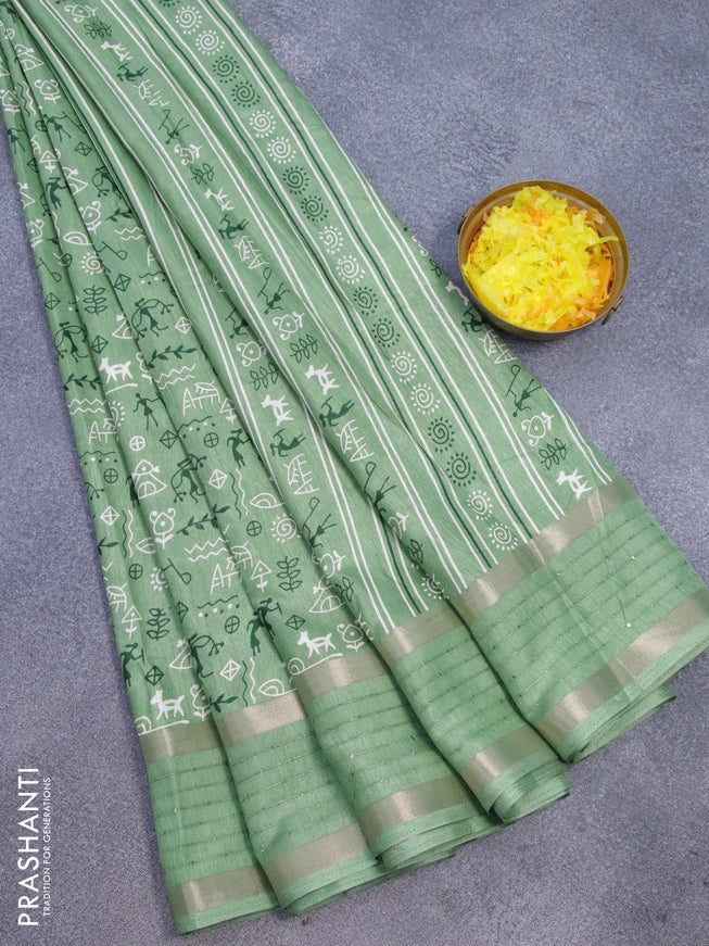 Semi dola saree green with allover warli prints and zari woven sequin work border