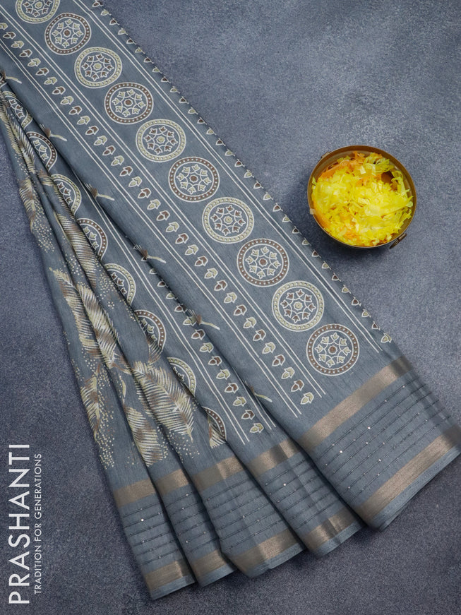 Semi dola saree grey with allover feather prints and zari woven sequin work border