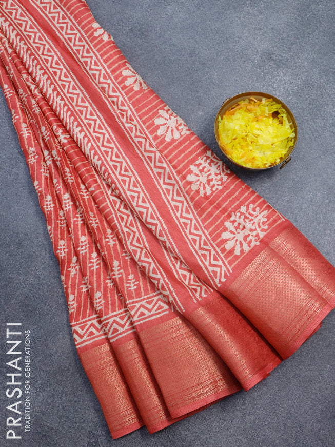 Semi dola saree red shade with allover batik butta prints and zari woven border