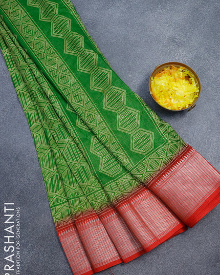 Semi dola saree green and red with allover geometric prints and zari woven border