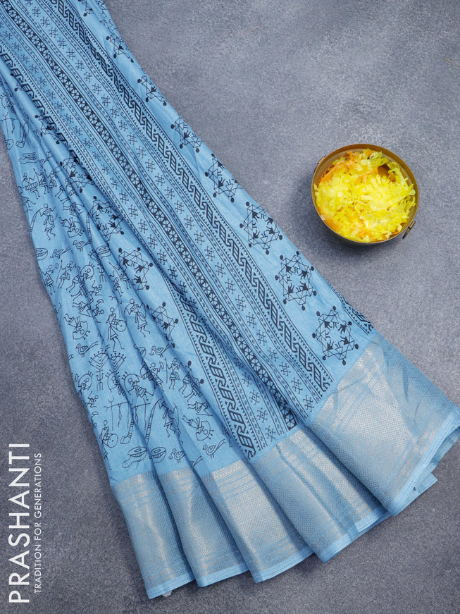 Semi dola saree light blue with allover warli prints and zari woven border