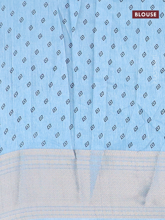 Semi dola saree light blue with allover warli prints and zari woven border