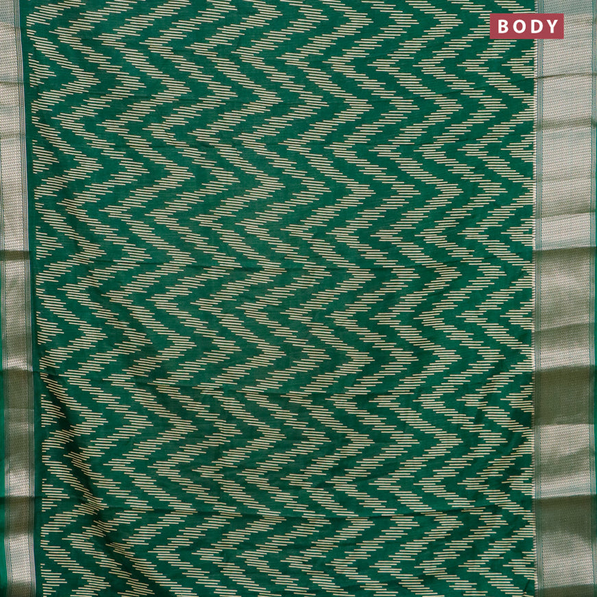 Semi dola saree green with allover prints and zari woven border