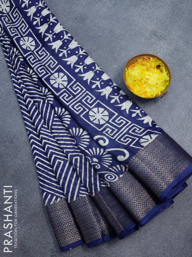 Semi dola saree blue with allover geometric prints and zari woven border