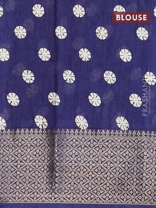 Semi dola saree blue with allover geometric prints and zari woven border