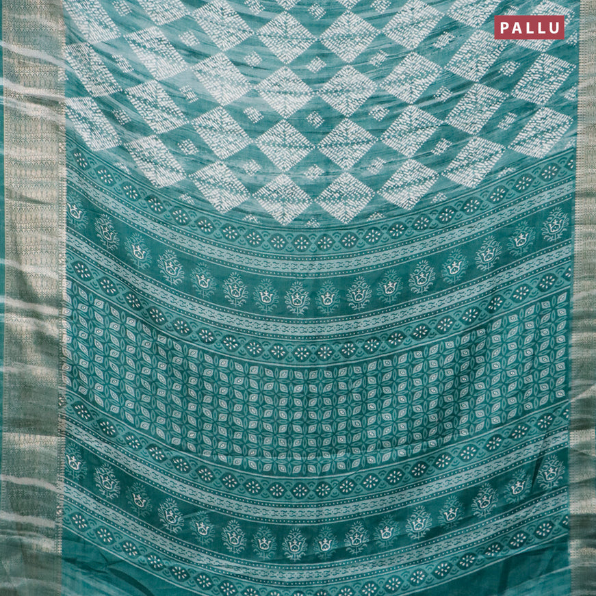Semi dola saree green with allover geometric prints and zari woven border