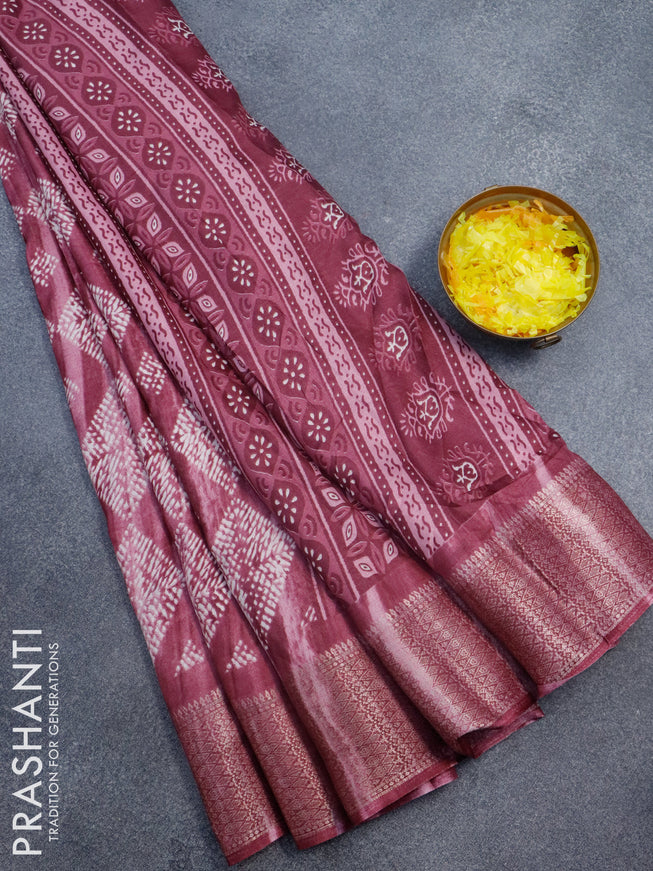 Semi dola saree maroon shade with allover geometric prints and zari woven border