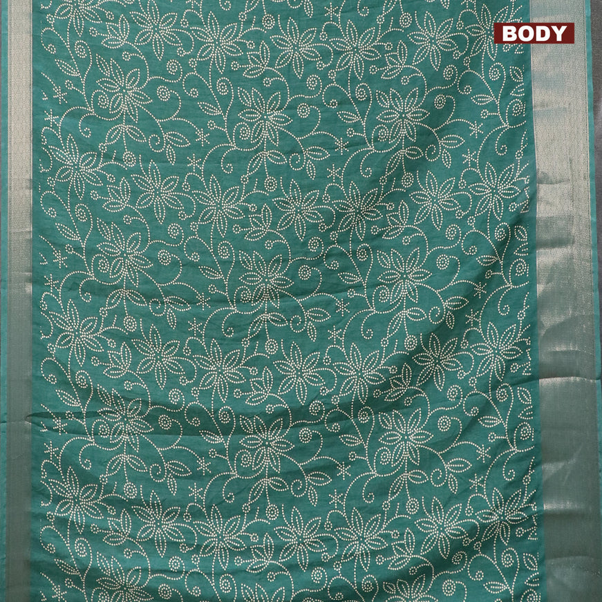 Semi dola saree green with allover bandhani prints and zari woven border