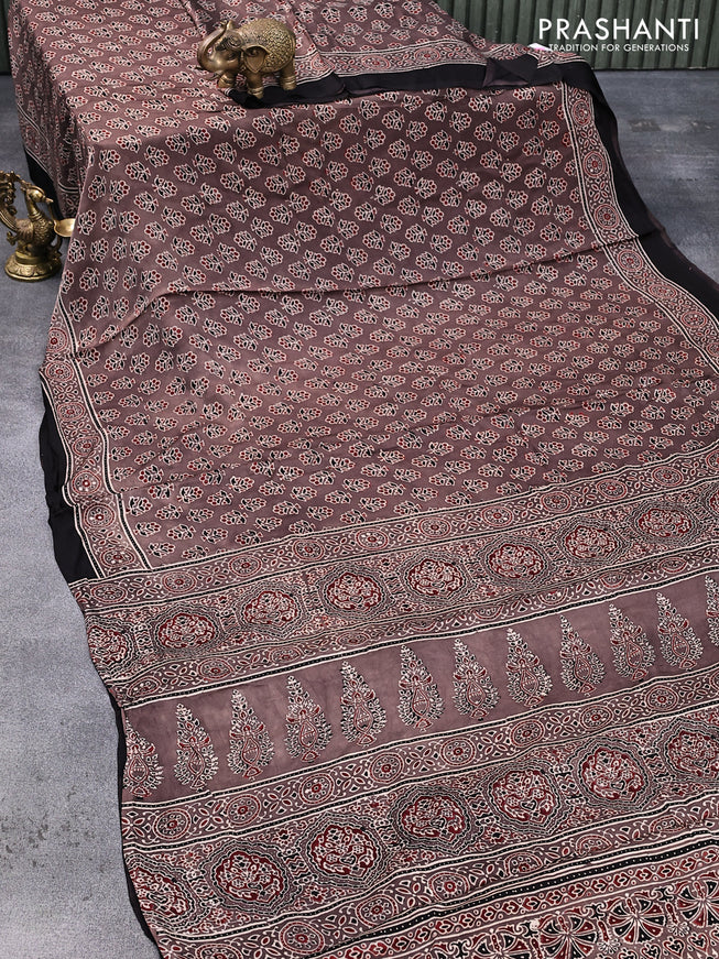Modal silk saree brown and black with allover floral butta prints and ajrakh printed pallu