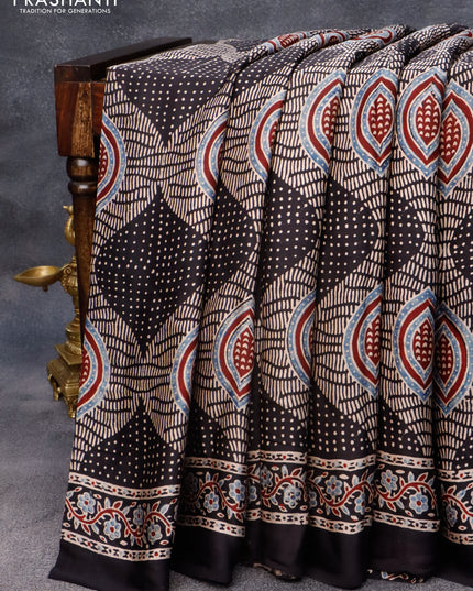 Modal silk saree black with allover ajrakh prints in borderless style
