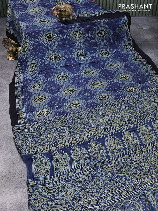 Modal silk saree blue and black with allover prints and ajrakh printed pallu