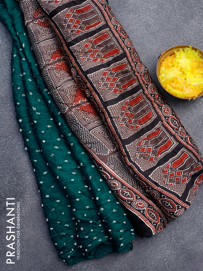 Modal silk saree teal green and black with allover bandhani prints and ajrakh printed pallu