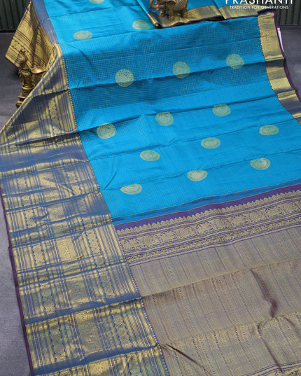 Pure kanjivaram silk saree cs blue and dual shade of maroon with allover zari checks & buttas and long zari woven border