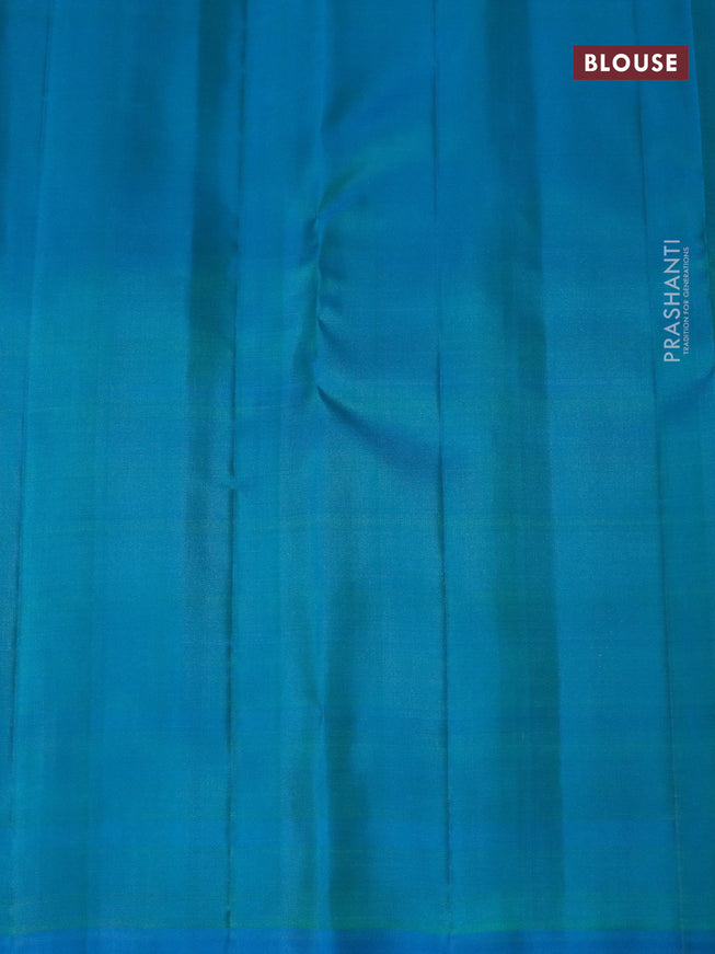 Pure kanjivaram silk saree dual shade of yellowish green and dual shade of teal blue with zari woven buttas and zari woven butta border