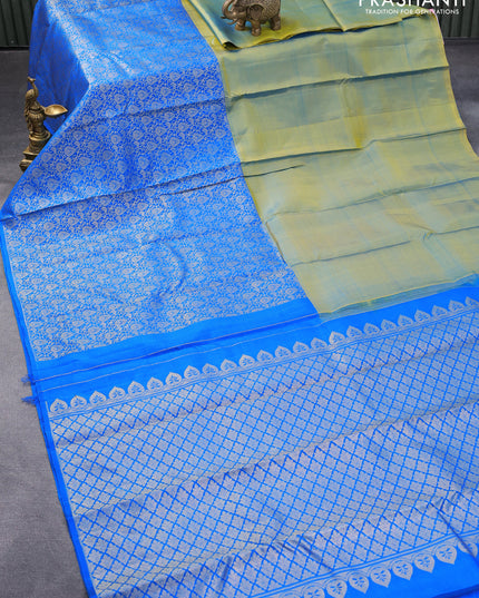 Pure kanjivaram silk saree dual shade of green and cs blue with half & half style and long zari woven border