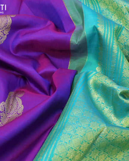 Pure kanjivaram silk saree dual shade of purple and cs blue with zari woven paisley buttas and rich zari woven border
