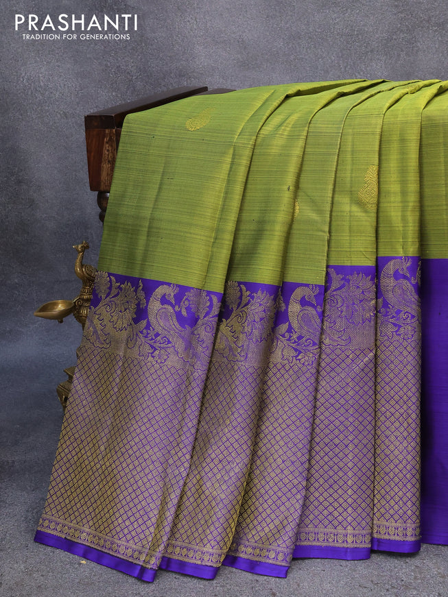Pure kanjivaram silk saree light green and blue with zari woven buttas and long rich zari woven border