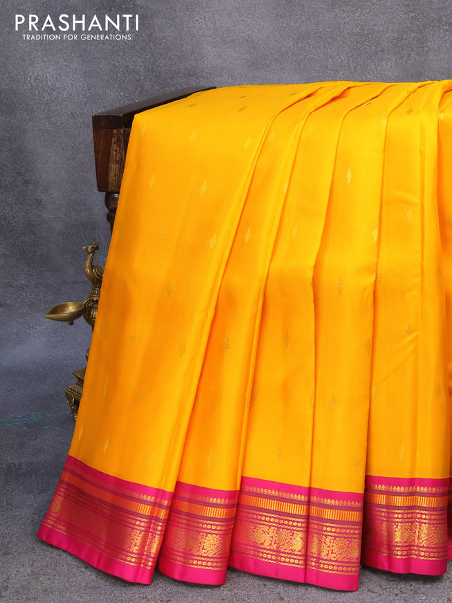 Pure kanjivaram silk saree mango yellow and pink with zari woven buttas and annam zari woven border
