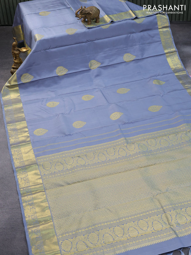 Pure kanjivaram silk saree pastel grey with zari woven buttas and annam zari woven border