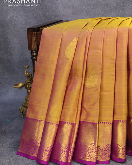 Pure kanjivaram silk saree dual shade of mustard and purple with zari woven buttas and zari woven border