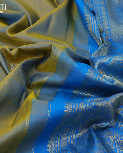 Pure kanjivaram silk saree dual shade of yellow and cs blue with zari woven buttas and annam zari woven border