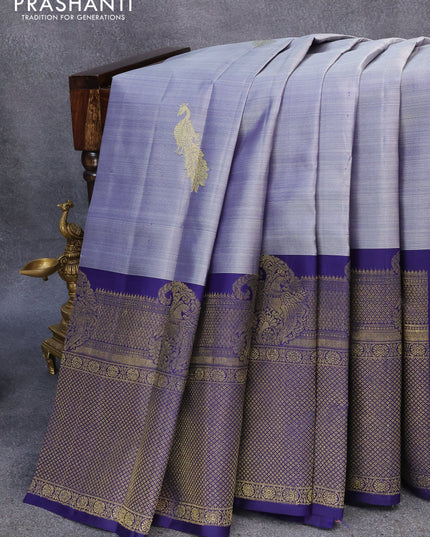 Pure kanjivaram silk saree grey shade and blue with peacock zari woven buttas and long rich zari woven border