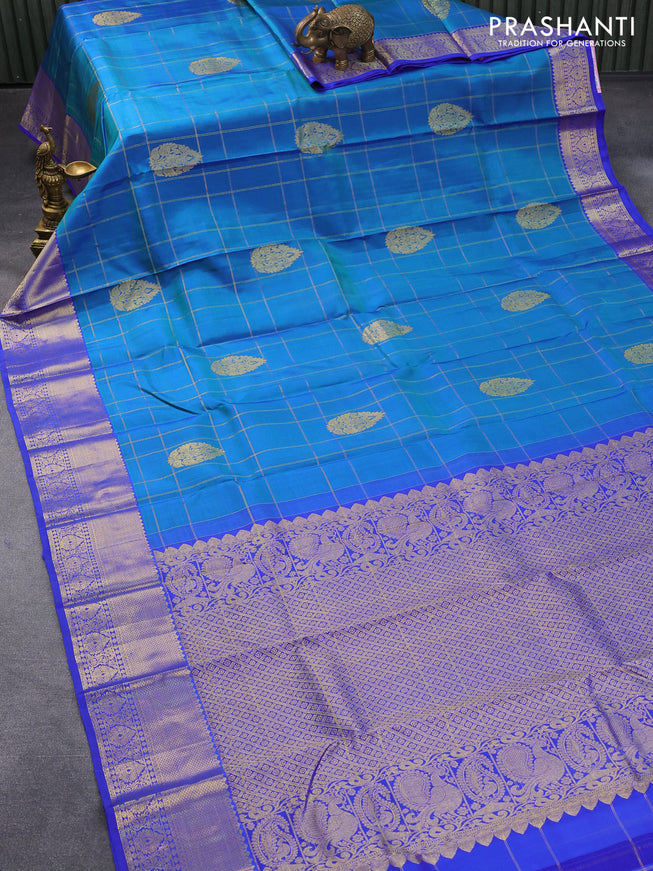 Pure kanjivaram silk saree dual shade of bluish green and blue with allover zari checks & buttas and zari woven border