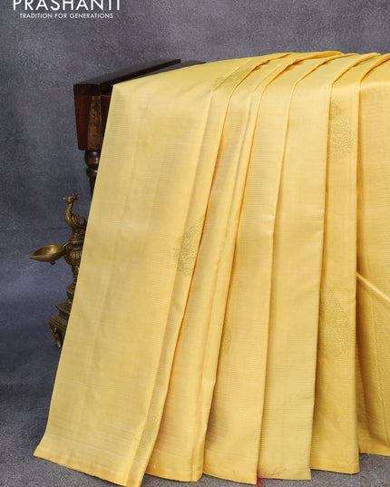 Pure kanjivaram silk saree pale yellow and maroon with allover zari weaves & buttas in borderless style